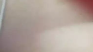 Indian holds a sex camera and touches her own XXX jugs and shaved slit