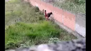 Hidden web camera records desi college gals outdoor sex scandal