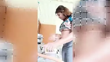 Chubby Desi gal while cooking can barely hide her perky XXX boobs