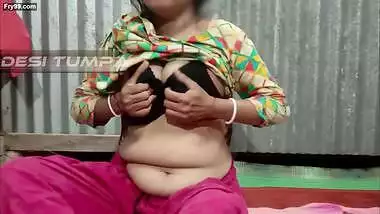 Desi Tumpa bhabhi shows her big white boobs and creamy tight pussy when her husband is not in the room