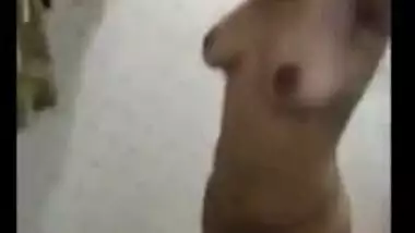 Woman has sex tits to expose in the XXX shower cabin and before mirror