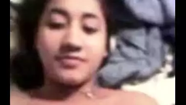 Hot Indian girl puts a condom on lover’s dick before sex
