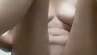 Nude Desi girl with perky XXX tits massages her wet sissy on camera