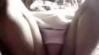Arousing Desi mom sits on floor and denudes snatch under the dress