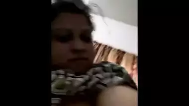 Cute Indian girl takes XXX sized tits out boasting about them on camera