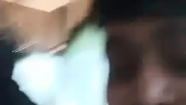 A guy presses a girl’s boobs outdoors in the local sex video