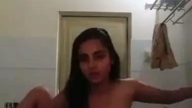 Indian nude MMS of an 18-year-old girl fingering in a bathroom