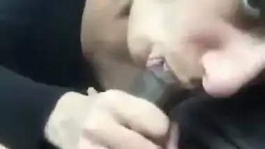 A nude Indian babe drinks her lover’s cum in the car