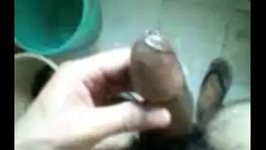 Boy alone in bathroom putting oil his cock and musterbating with the load of cum