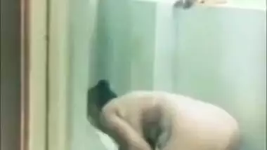 A chubby Desi aunty bathing outdoor nude on cam for her lover XXX video