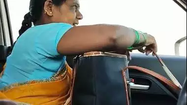 Man shows his dick to a milf in a moving van in Tamil porn