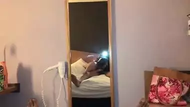 Long-haired Indian gal polishes lover's XXX dick in front of mirror