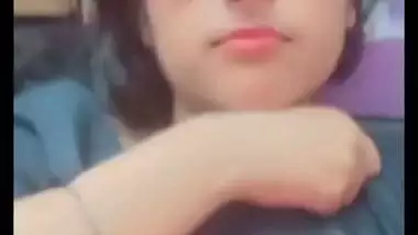 Bhabhi in glasses goes naked and fingers cunt