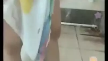 Naughty Indian girl sneaks in bathroom for sex video chat with XXX friend