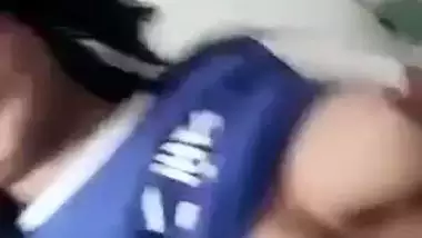 Beautiful desi girl lifting top to reveal sexy boobs