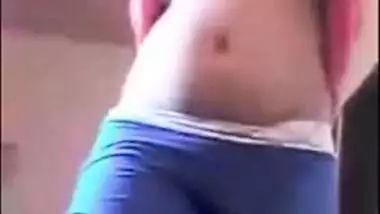 Indian chick in a red robe bares her natural XXX breasts to the sex fan