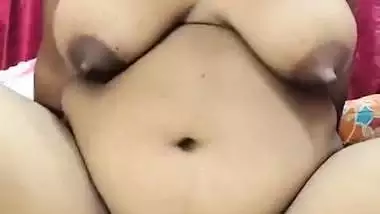 Bengali slut Lisa feeding boobs and foot fingering pussy