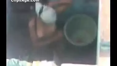 Neighbor Tamil girl voyeur video captured from second floor while she dress up