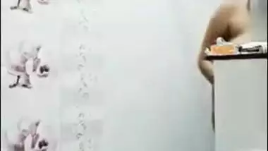 Pregnant aunty of Indian origin puts on clothes after taking a shower