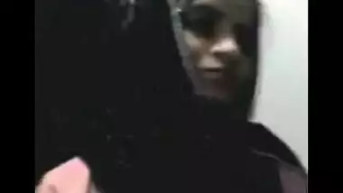 Bengali sex movie scene of a glamorous legal age teenager stripping for her lover on cam