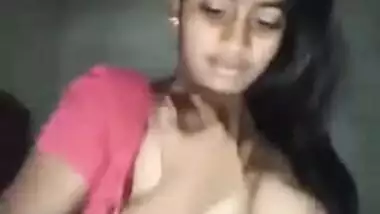 Young village slut strips to show her perky Desi tits for XXX video
