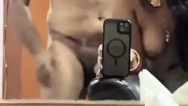 Tamil girl giving handjob to boyfriend in front of mirror