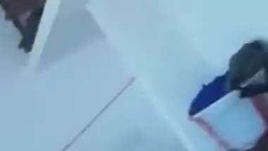Man films video of Indian wife putting on clothes after taking a shower