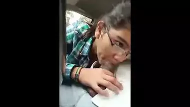 Indian porn mms of a slutty teen giving a blowjob to lover in his car