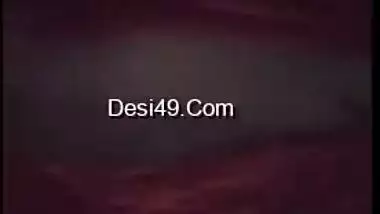 Young gal in red lingerie teases her XXX Desi pussy for the camera