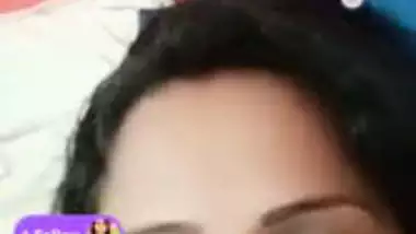 Stripchat girl Trisha playing with naked boobs