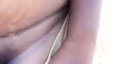 Dehati Desi shows off XXX sized titties and hairy twat in the fresh air