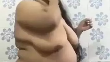 Fatty Desi slut shows off her sex sized body focusing on XXX tits