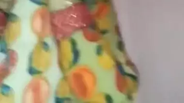 Shy Desi teeny hikes up dress to show her XXX pussy in the bathroom