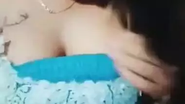 Busty Desi seductress XXX teases with her immense tits for the cam