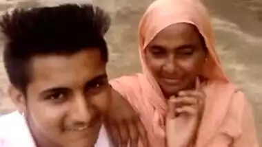 Boy and Desi MILF smile on camera thinking about upcoming porn video
