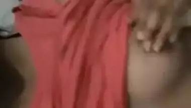 Pink T-shirt is pulled up so Indian sex girl can boast about her XXX tits