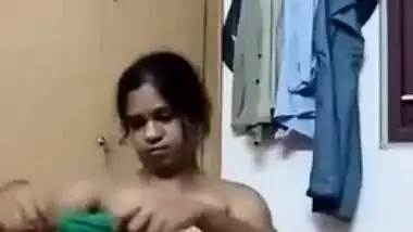 Indian girl doesn't know what to wear and flashes body parts in homemade porn