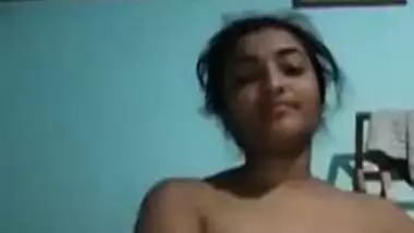 Indian love allows her sex fans to see these XXX melons under a fan