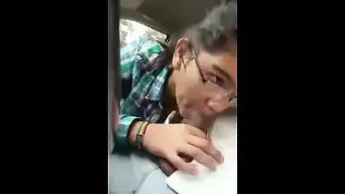 Indian porn mms of a horny teen giving a blow job to boyfriend in his car