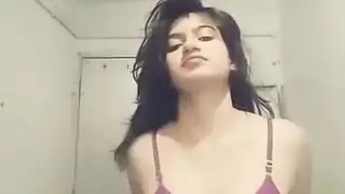 Indian teen unbuttons green shirt and takes it off just like her bra