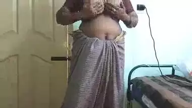 desi indian tamil telugu kannada malayalam hindi horny cheating wife vanitha wearing grey colour saree showing big boobs and shaved pussy press hard