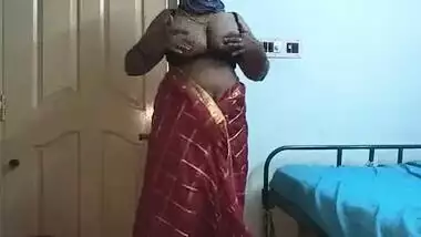 desi indian tamil telugu kannada malayalam hindi horny cheating wife vanitha wearing cherry red colour saree showing big boobs and shaved pussy press
