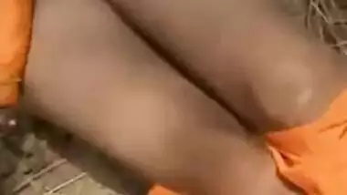 Man watches Desi girlfriend in orange sari taking pants off for XXX video