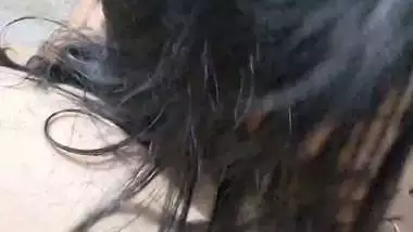 GF with smiling face gives blowjob to boyfriend