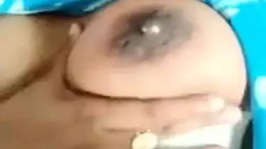 Desi Bhabhi's milking tits exposed in the close-up self-made XXX video