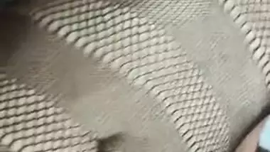 Hot Desi babe in fishnet dress has her pussy XXX rubbed by lover