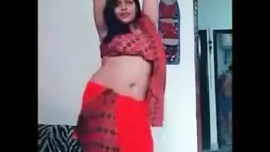 Female performs an Indian sex belly dance in a XXX manner on camera