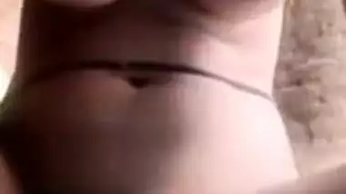 Sexy Desi wench from the village teases with her XXX cunt on cam