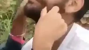 Indian outdoor sex of a guy sucking his GF’s tight boobs