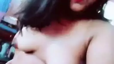 Desi girl with dark XXX nipples and playful eyes poses naked on webcam